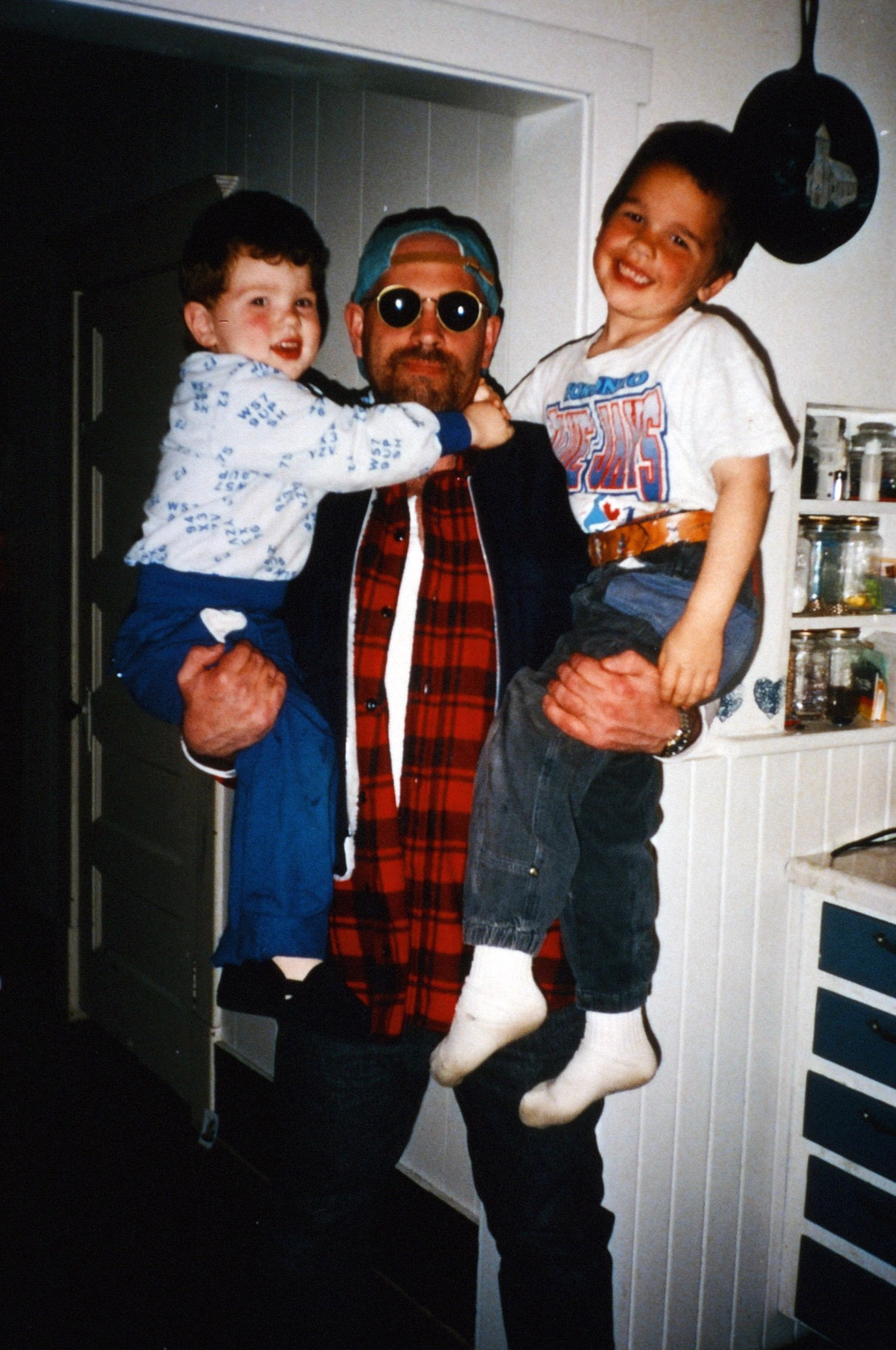 River Rats — Gideon Heath (credited as Bill Baker), in costume as Lonny on his first day of filming, getting good-luck hugs from his sons Mitchell and Jared, 1995